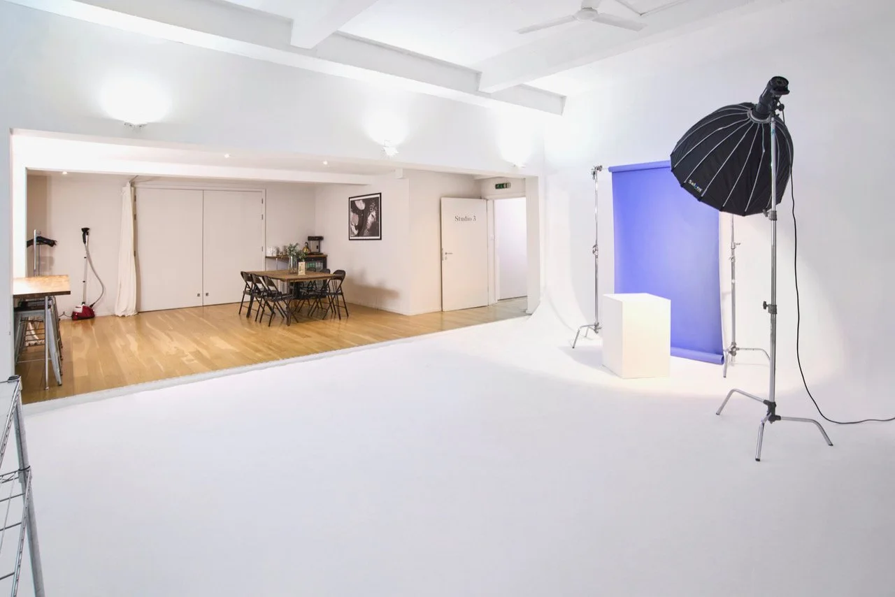 Studio 3 intimate shooting space with white cove and oak flooring